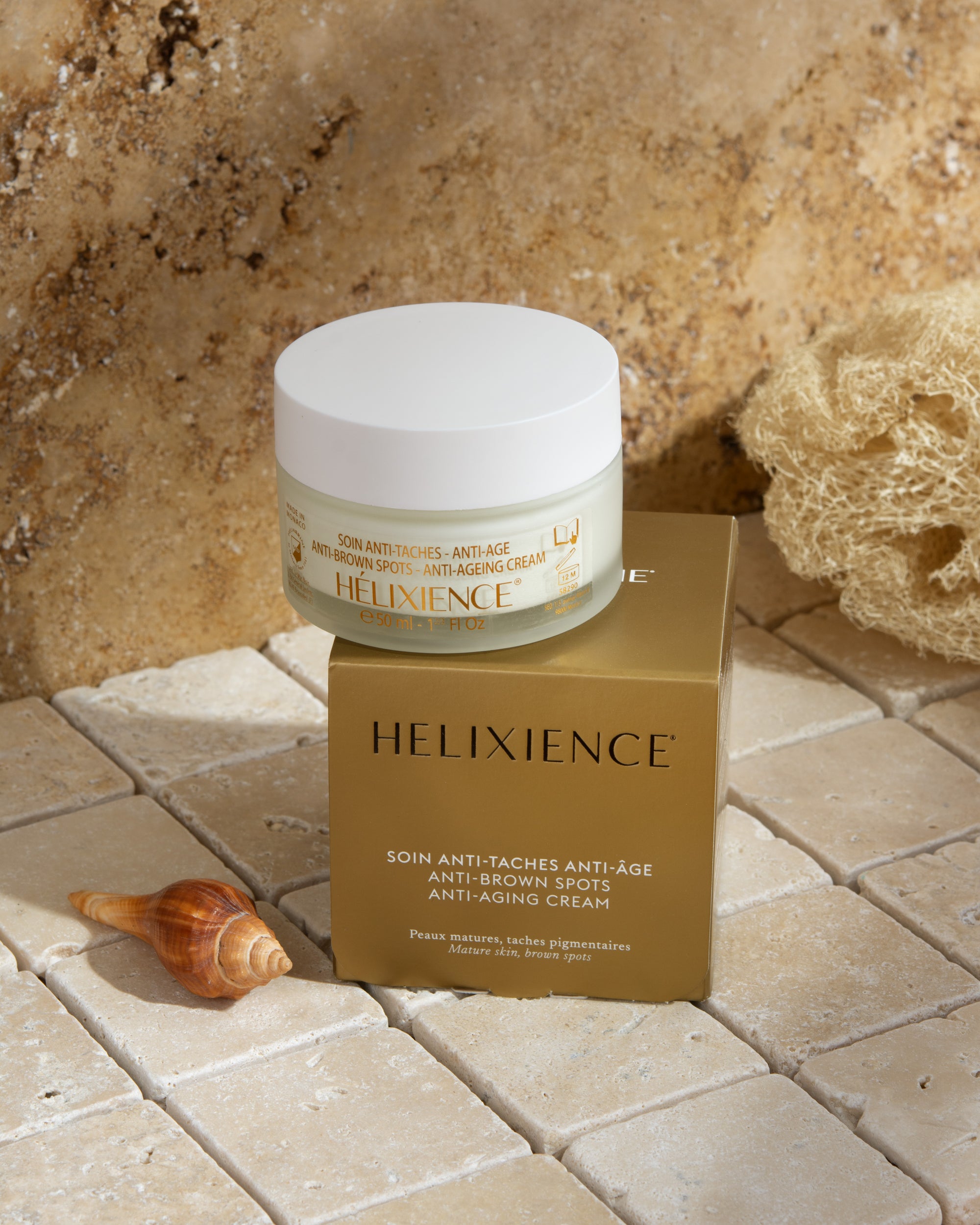 Crème Anti-Taches Anti-Âge Helixience Héliabrine, pot et coffret doré, contre les taches pigmentaires, à la Maison Constance de Blainville