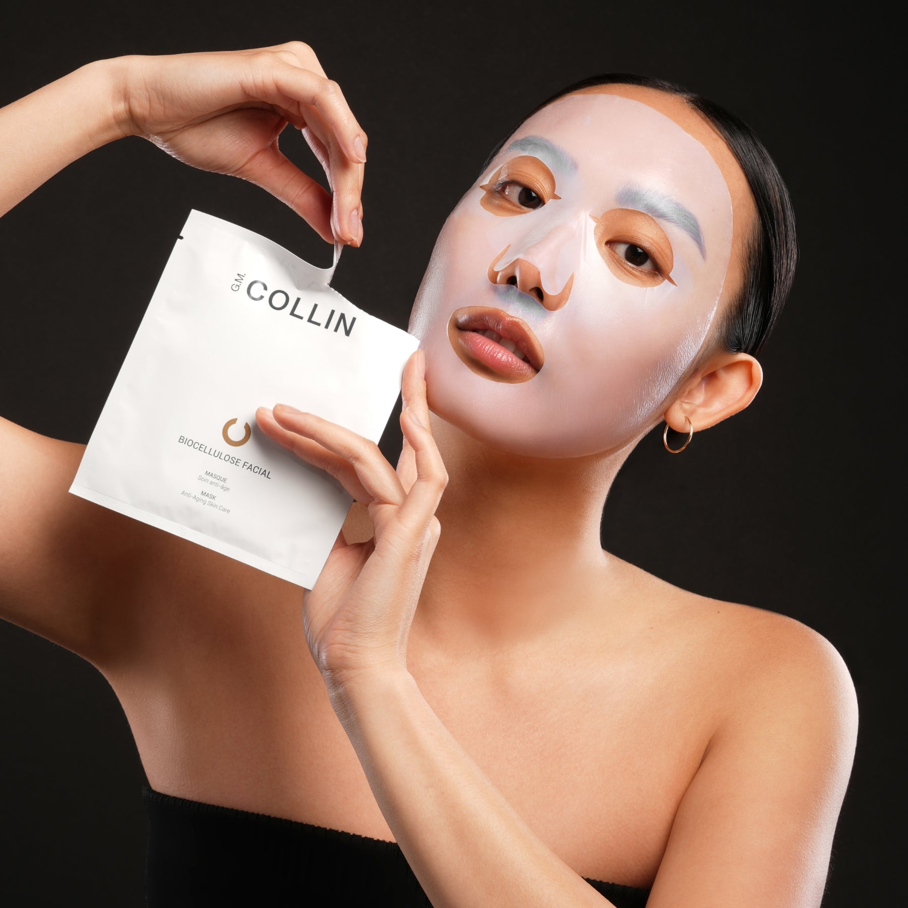 Biocellulose Masque visage G.M. Collin, pose sur le visage, à Blainville