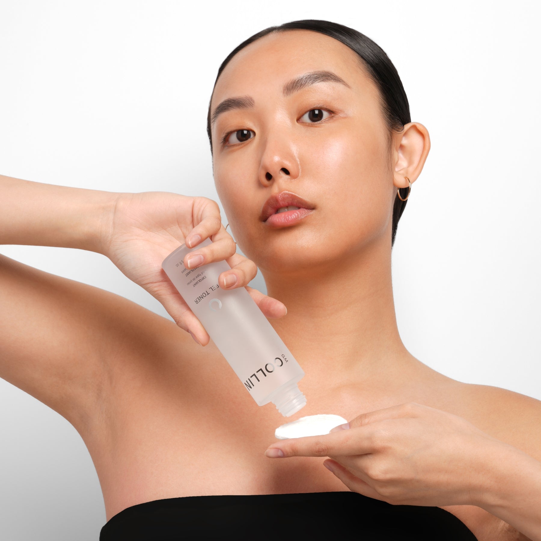Peel Toner Exfoliant G.M. Collin, application au coton, à Blainville